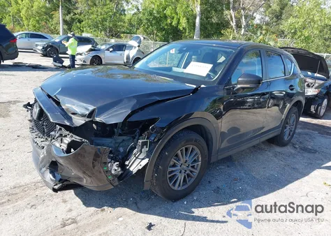 2021 Mazda Cx-5 Touring z USA, uszkodzony, nr VIN JM3KFBCM7M1495936